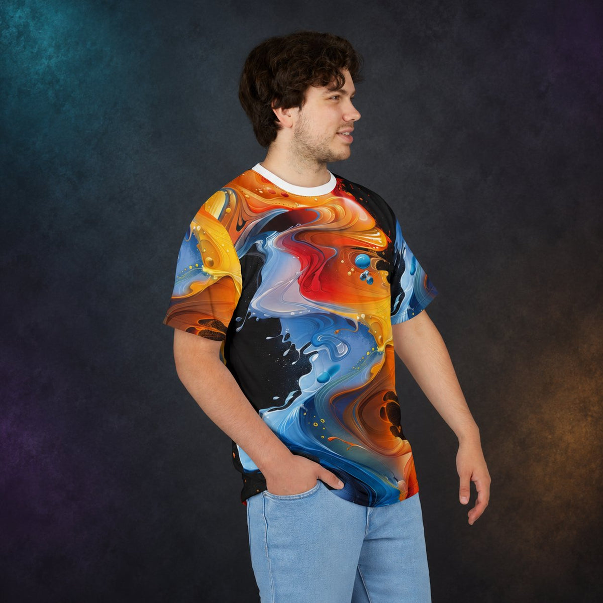 Front and side view of a man wearing the abstract fluid art all-over print T-shirt against a charcoal studio background.
