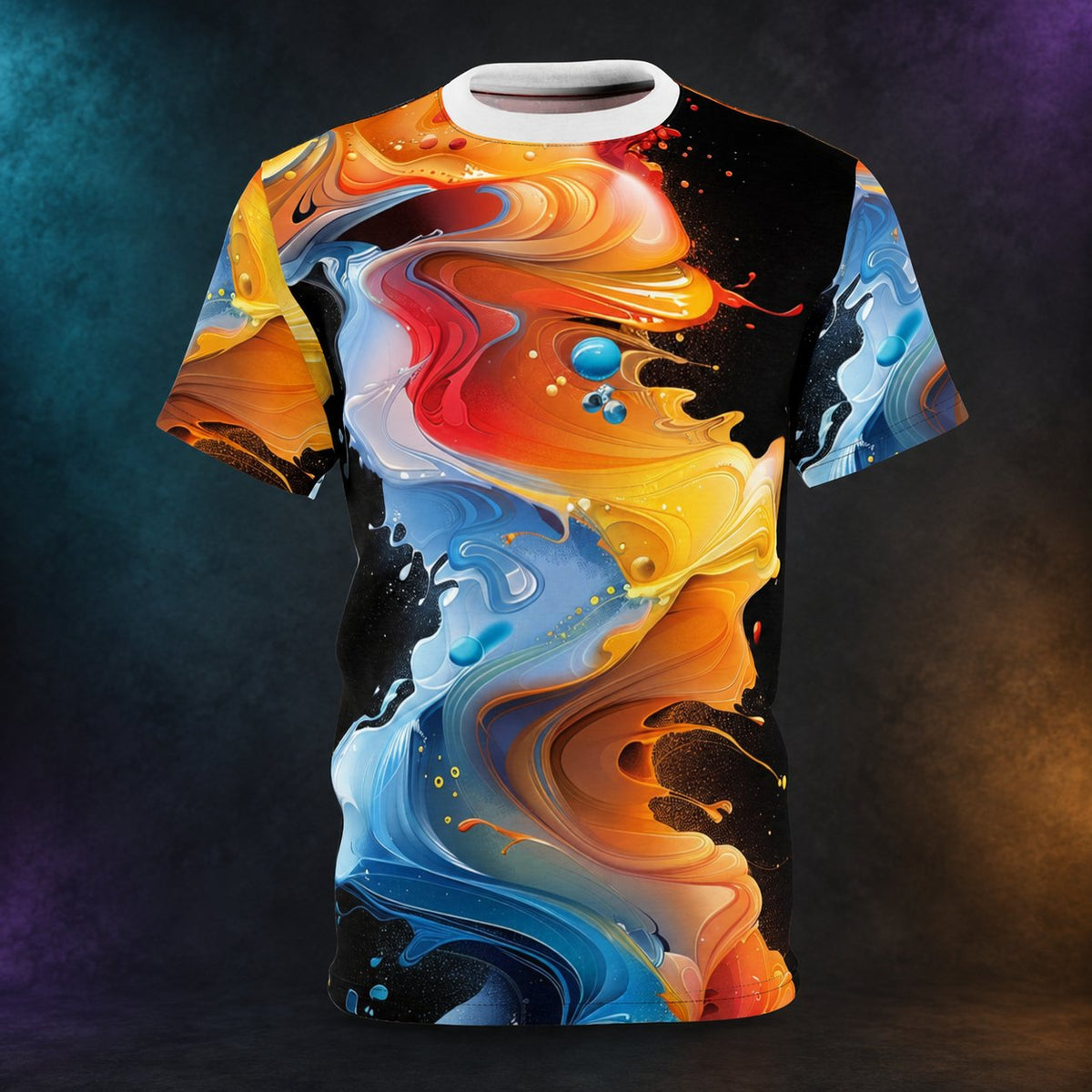 Abstract fluid art all-over print T-shirt, front view on a charcoal studio background with teal and amber lighting.