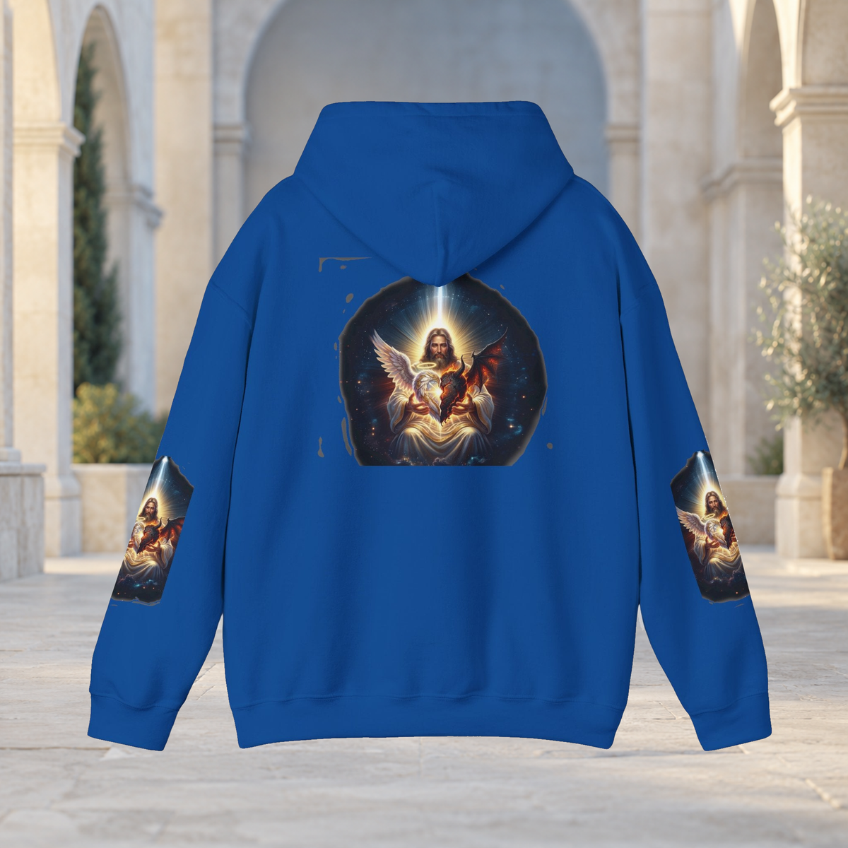 blue Divine Grace hoodie back view with original artwork and a softly lit sandstone background.